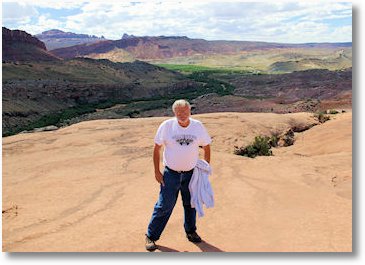 mike on the slick rock trail to delicate arch