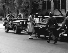Soldiers from the 101st Airborne Division escort African-American students to Central High School in Little Rock in Sept. 1957