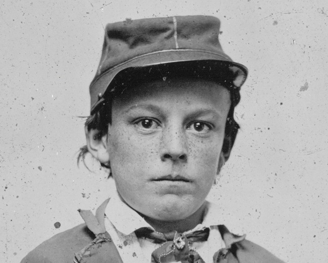Unidentified young soldier in Confederate infantry uniform - possibly drummer boy Unidentified young soldier in Confederate infantry uniform - possibly drummer boy