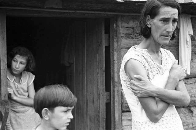 Family of a Resettlement Administration client in the doorway of their home in Boone County, Arkansas