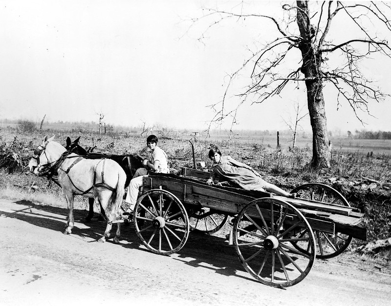 These farm girls went to the village for the Red Cross food supplies, which they are taking home to the folks, who live in the foothills of the Ozarks, near Damascus, Ark.